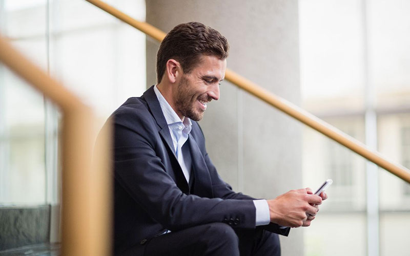 man-texting-on-phone